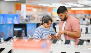 two people looking at India's most trusted Emi finance locker- smf